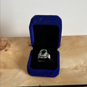 Elegant Silver Ring with Green Gemstone